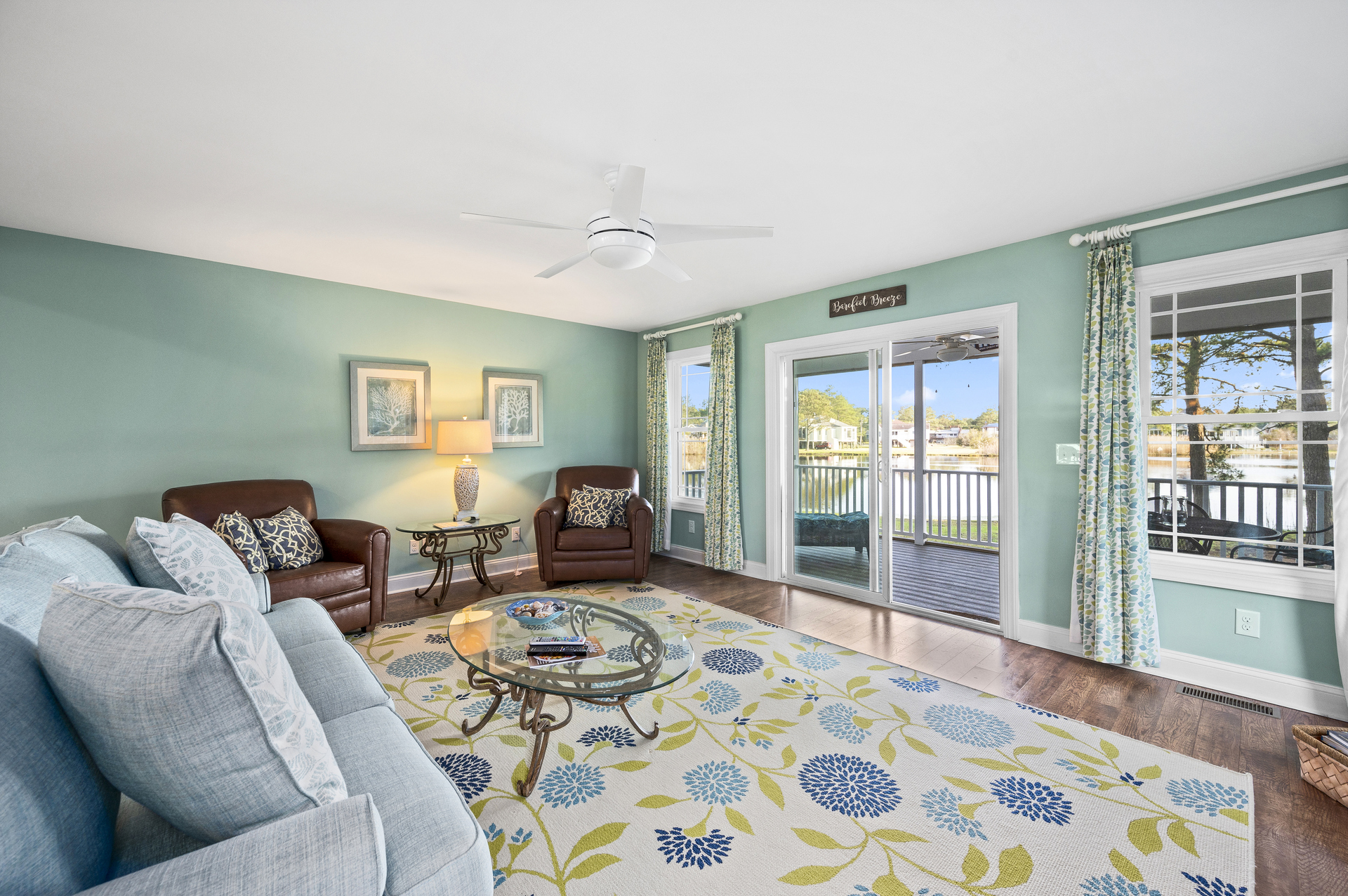 Sliders lead to the Screened Porch and gorgeous Backyard.