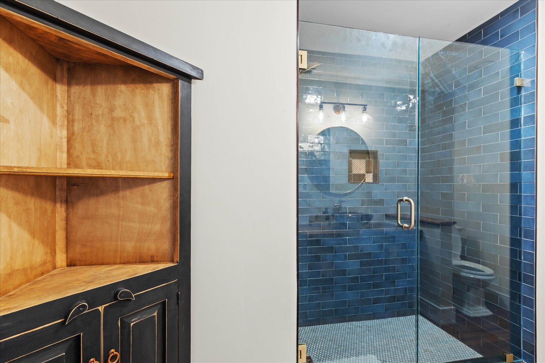 Full Bath 2 also has a gorgeous deep blue Walk-in Shower.
