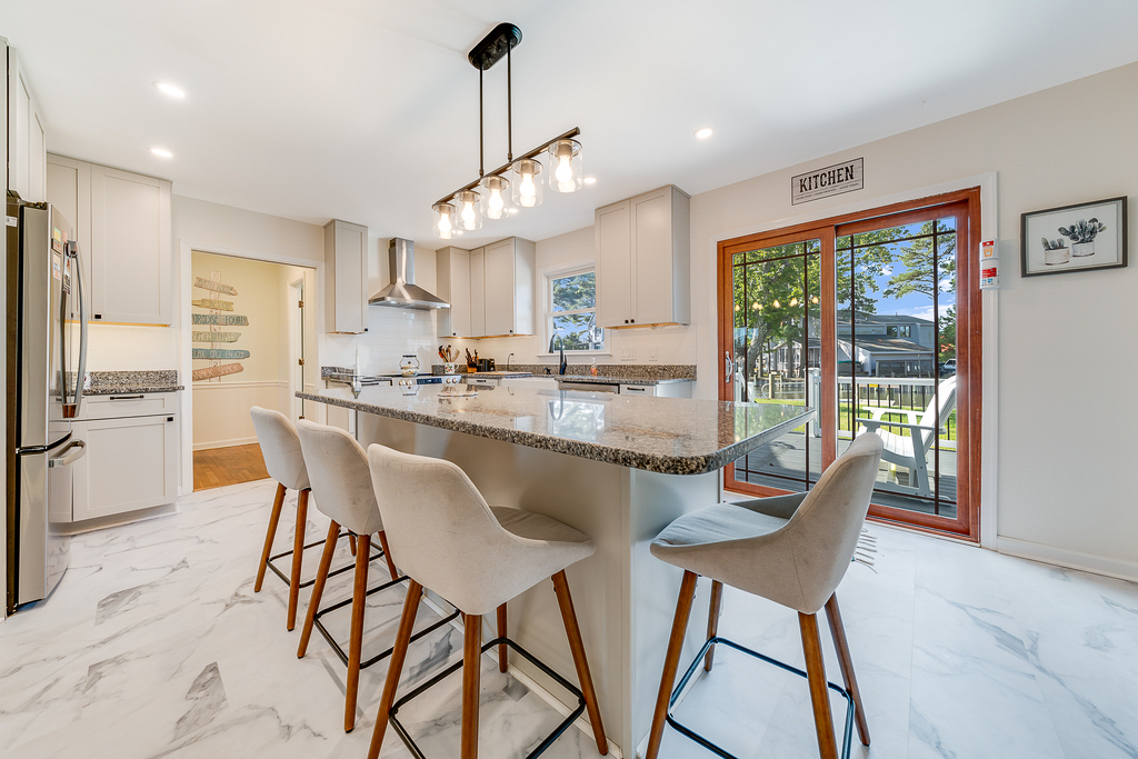 Plenty of room to gather together in the Kitchen making great food and memories.