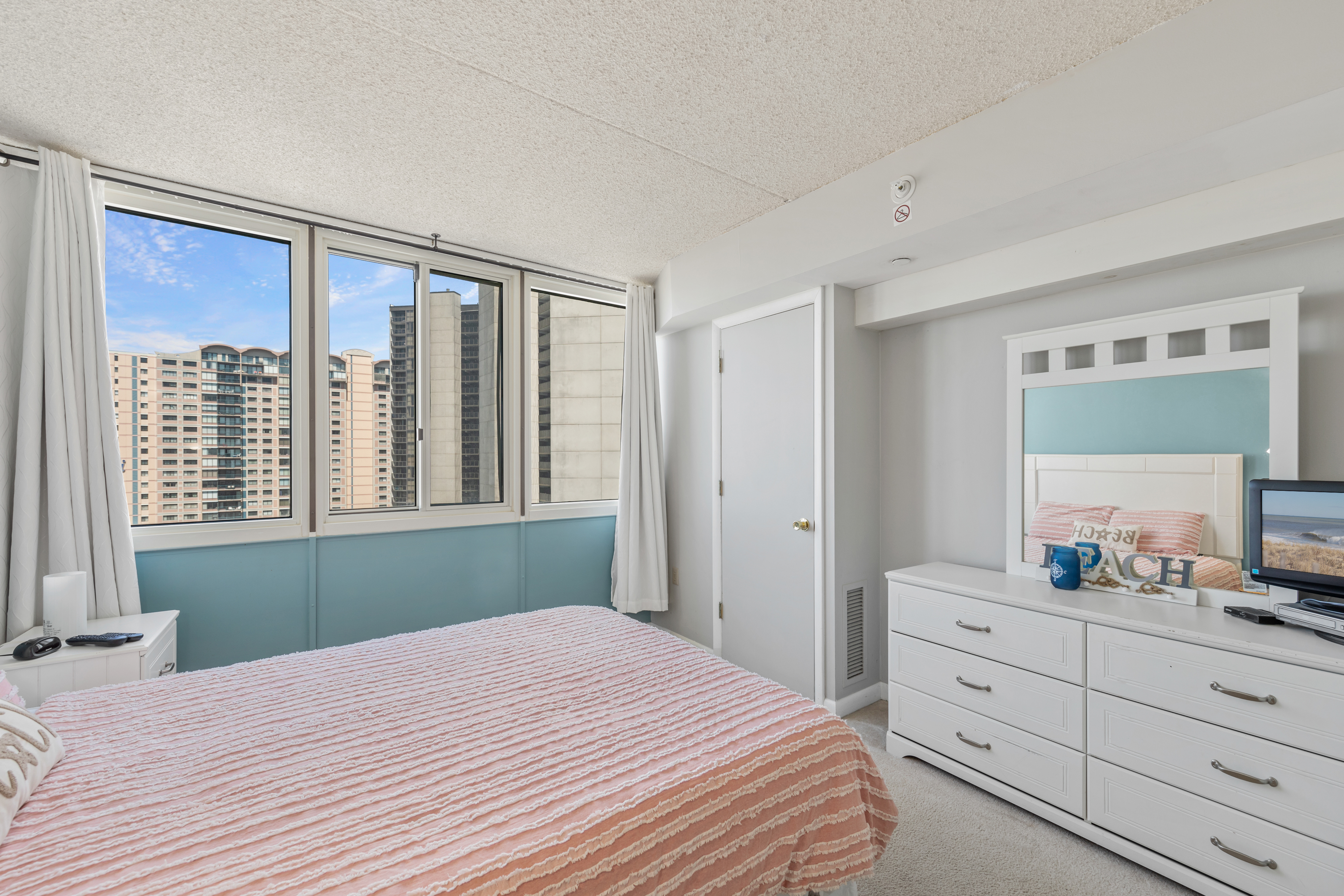 Warm and inviting this bedroom is sure to be a peaceful retreat