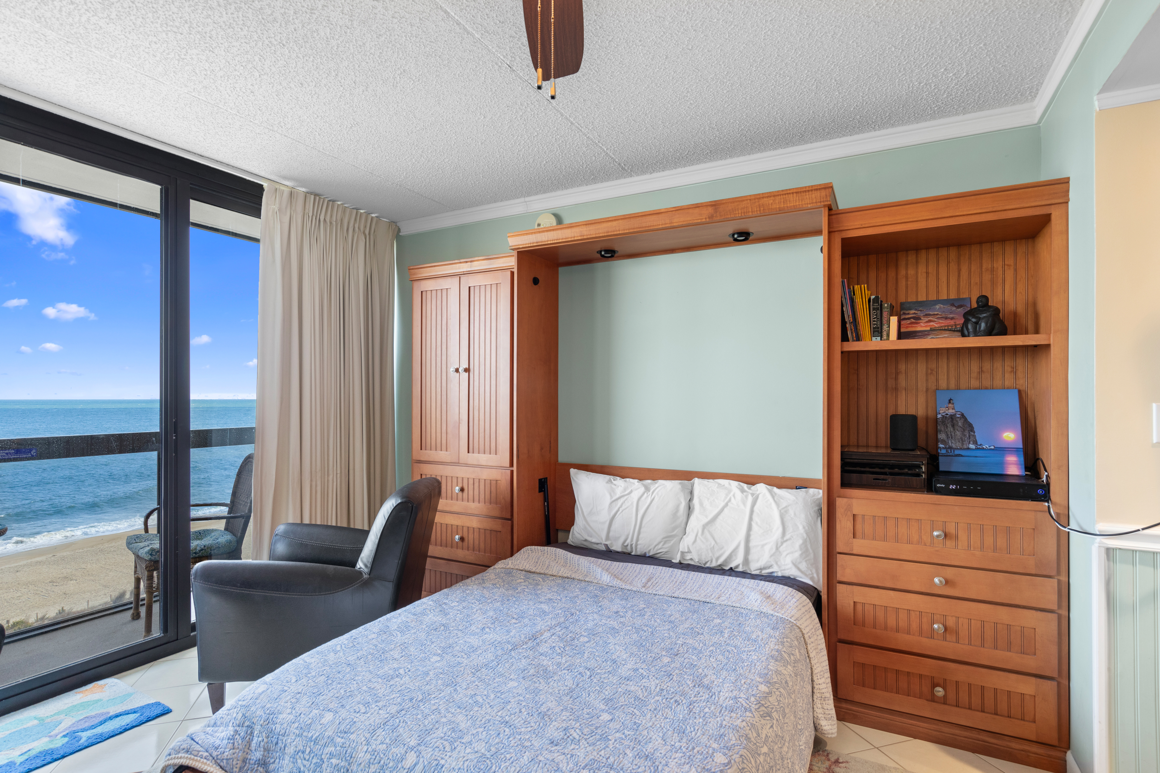 The Primary Bed is a pull down Murphy Bed in the Living Area, you can enjoy the Ocean View right from there!