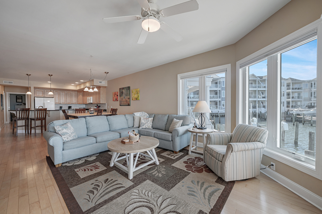 Relax in the Living Area with it's peaceful Coastal Colors and comfy furnishings!
