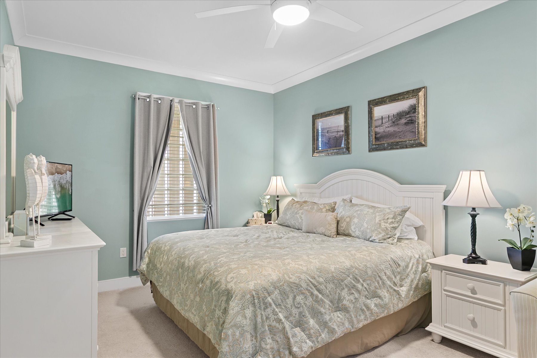 The spacious Primary Bedroom feels calm and comfortable.