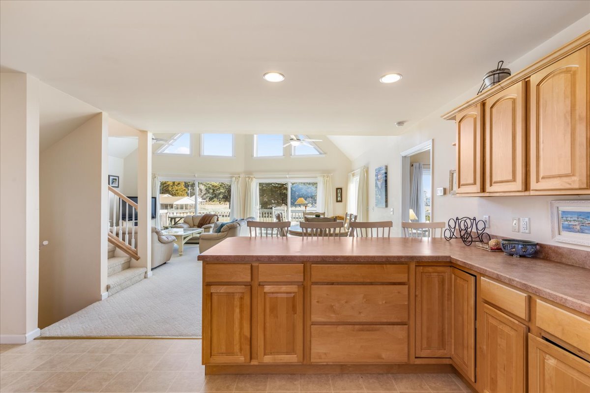 Kitchen overlooks Living and Dining Areas, and has Water Views.