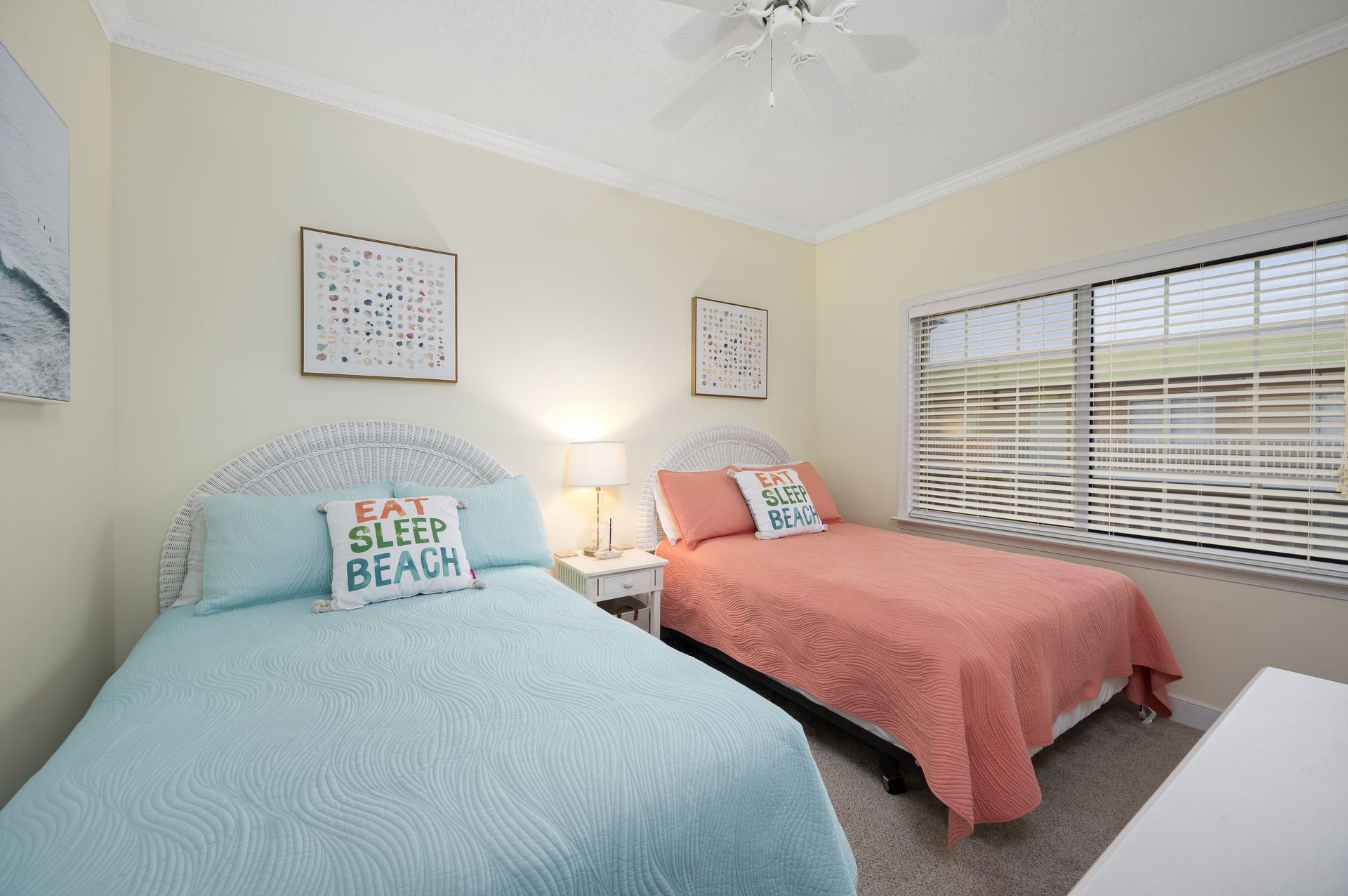 Bedroom 2 has 2 Full Beds and soothing Coastal Colors.