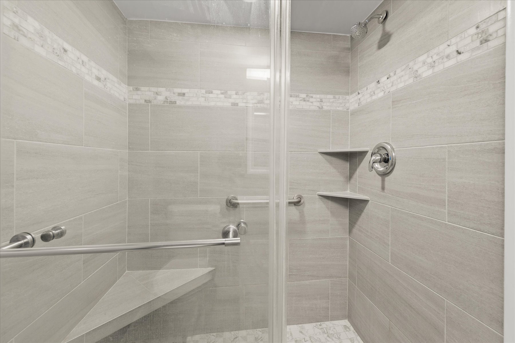 This Shared Bath features a spacious Walk in Shower.