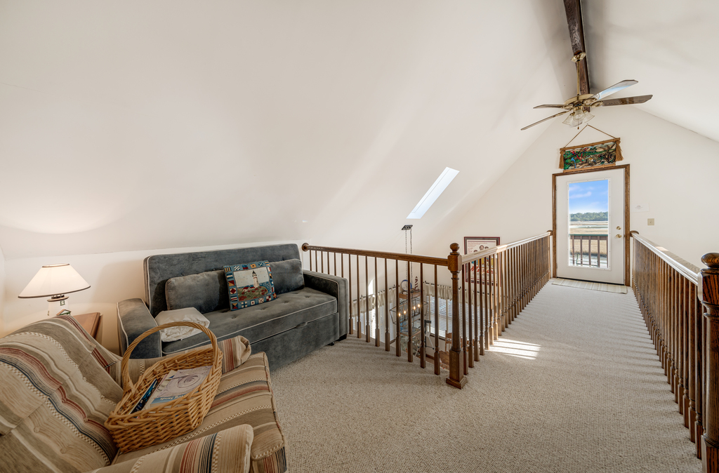 Wandering upstairs to the Loft, you'll find a great Seating Area with Full Sleeper Sofa.