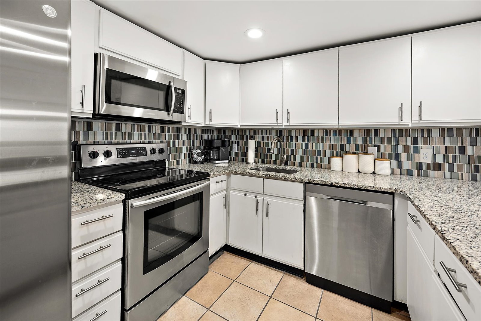 Fully equipped with a modern stove, microwave, and integrated sink to handle all your vacation cooking needs with ease.