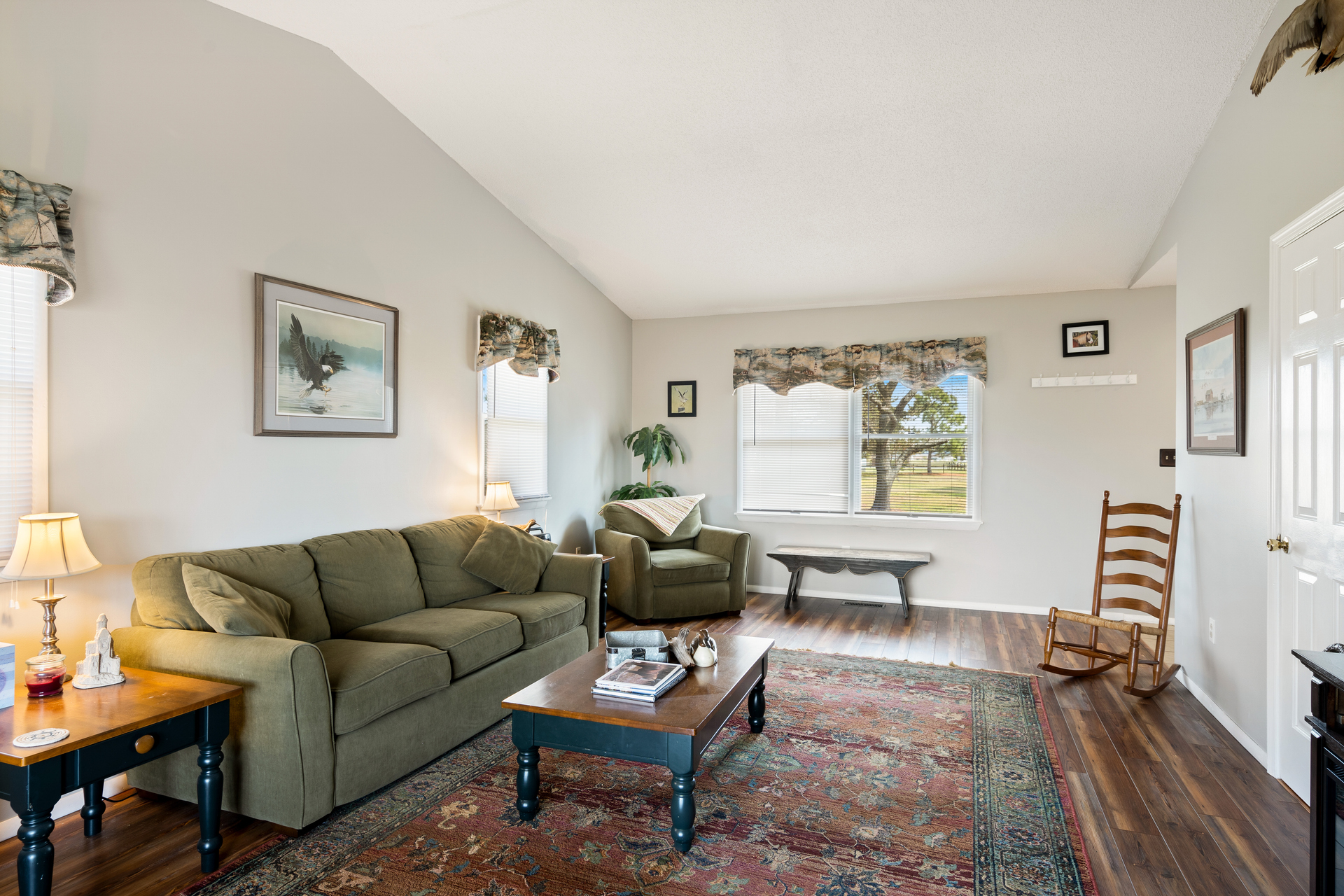 The Living Area is warm and welcoming adorned in earthy tones.