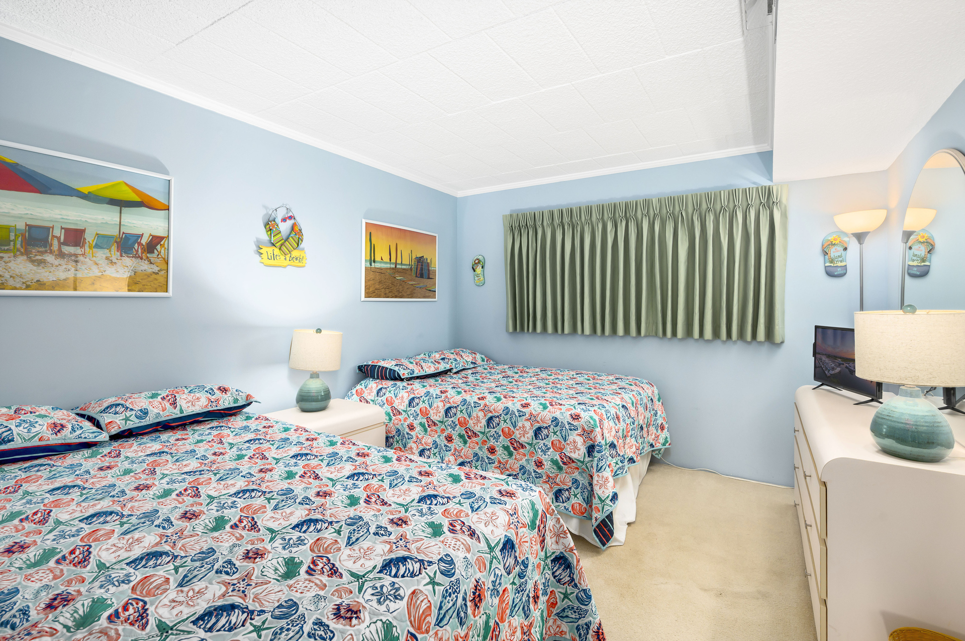 Bedroom 2 comfortably sleeps 4 with a Queen & Full Bed.