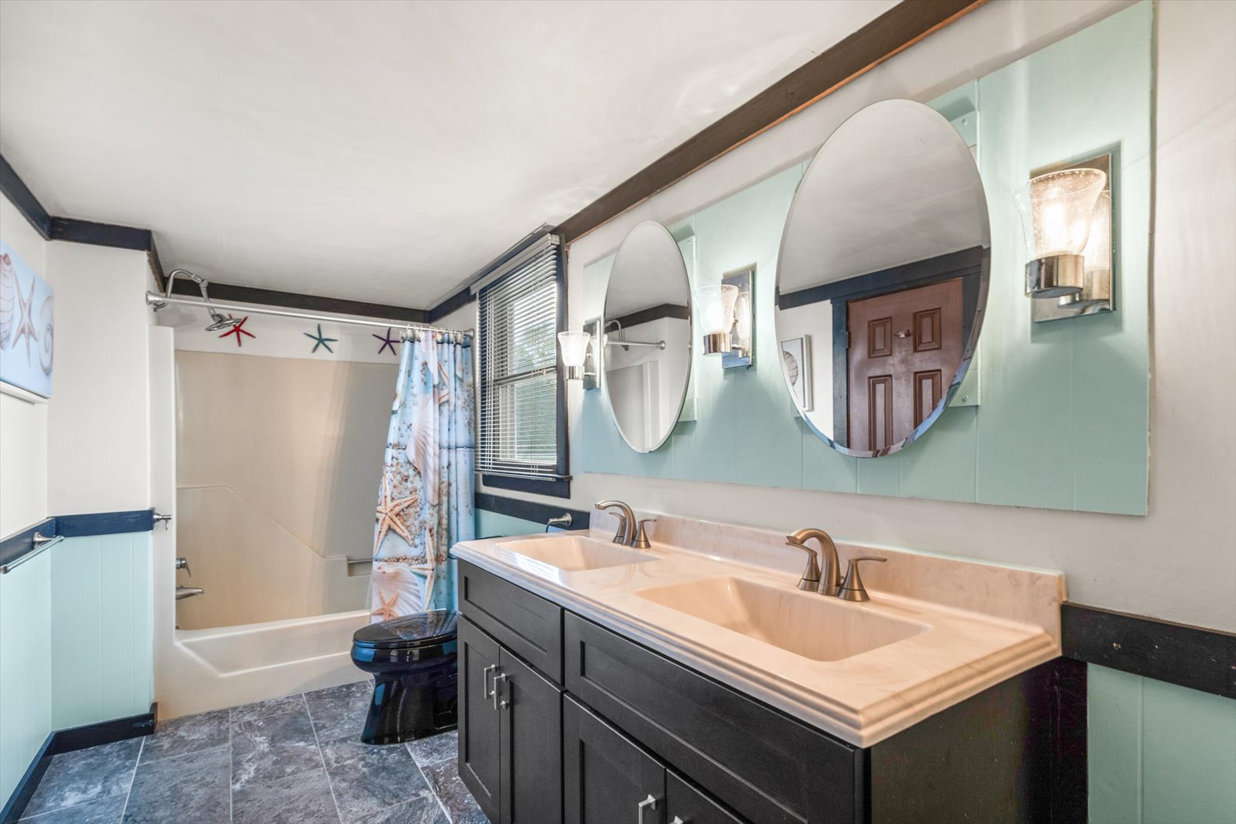 The bedroom includes a Full Private Attached Bathroom with a Dual Vanity!