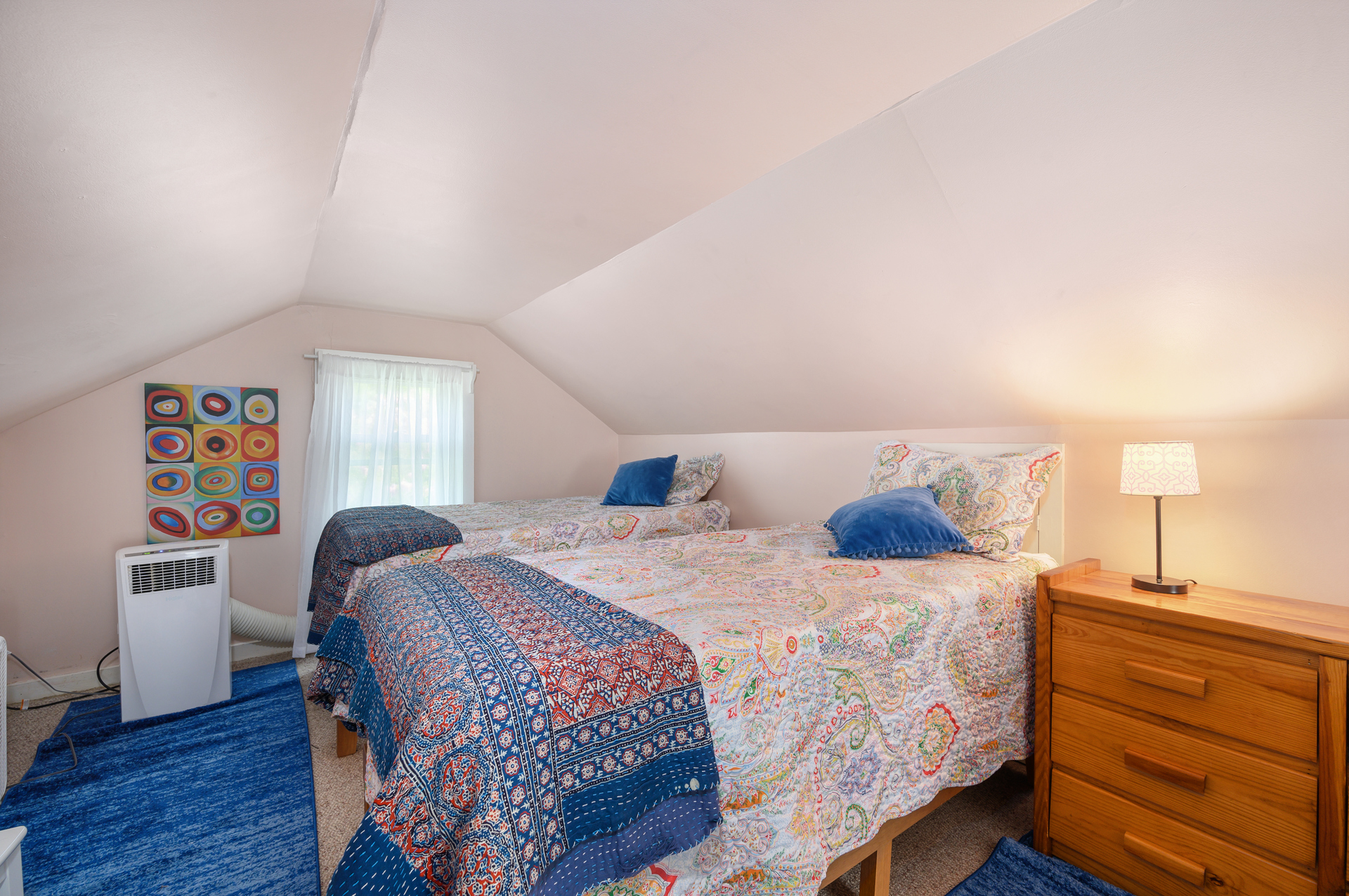 Upstairs you'll find 3 Twin Beds.