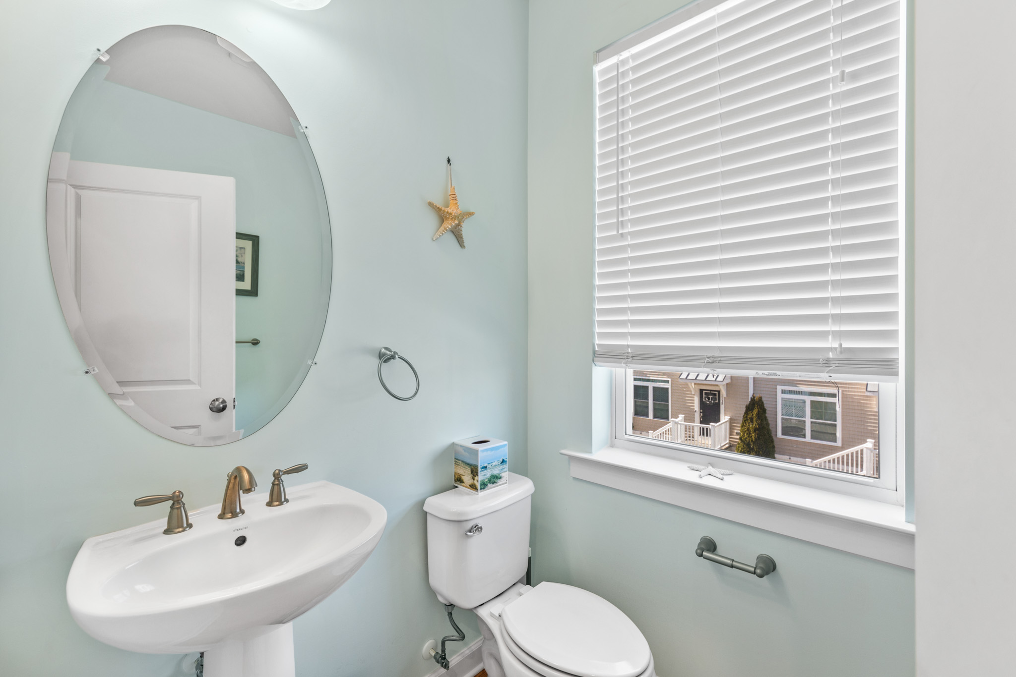 Convenient hall half bath.