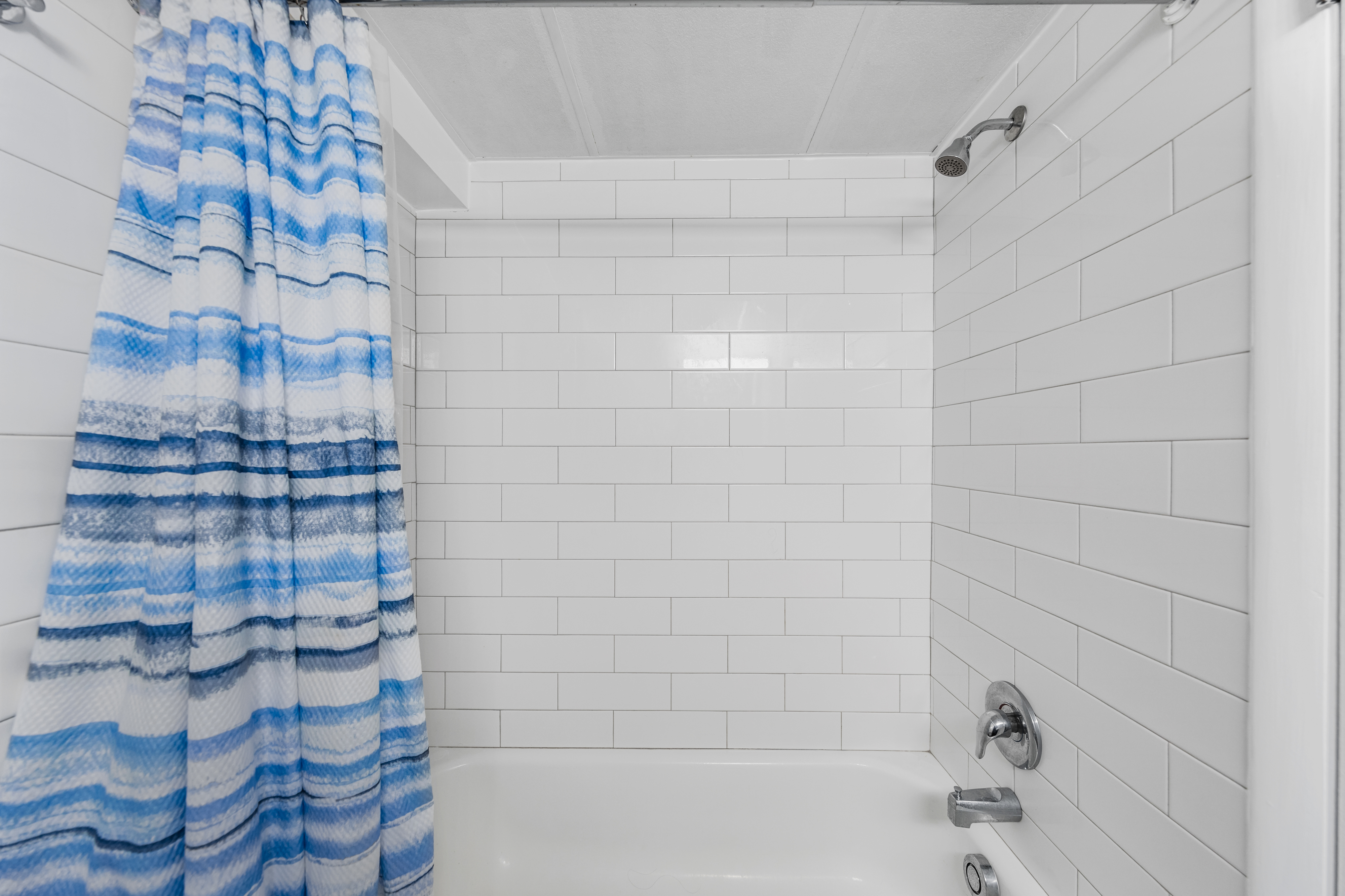This Full Bath features a Shower/Tub Combo.
