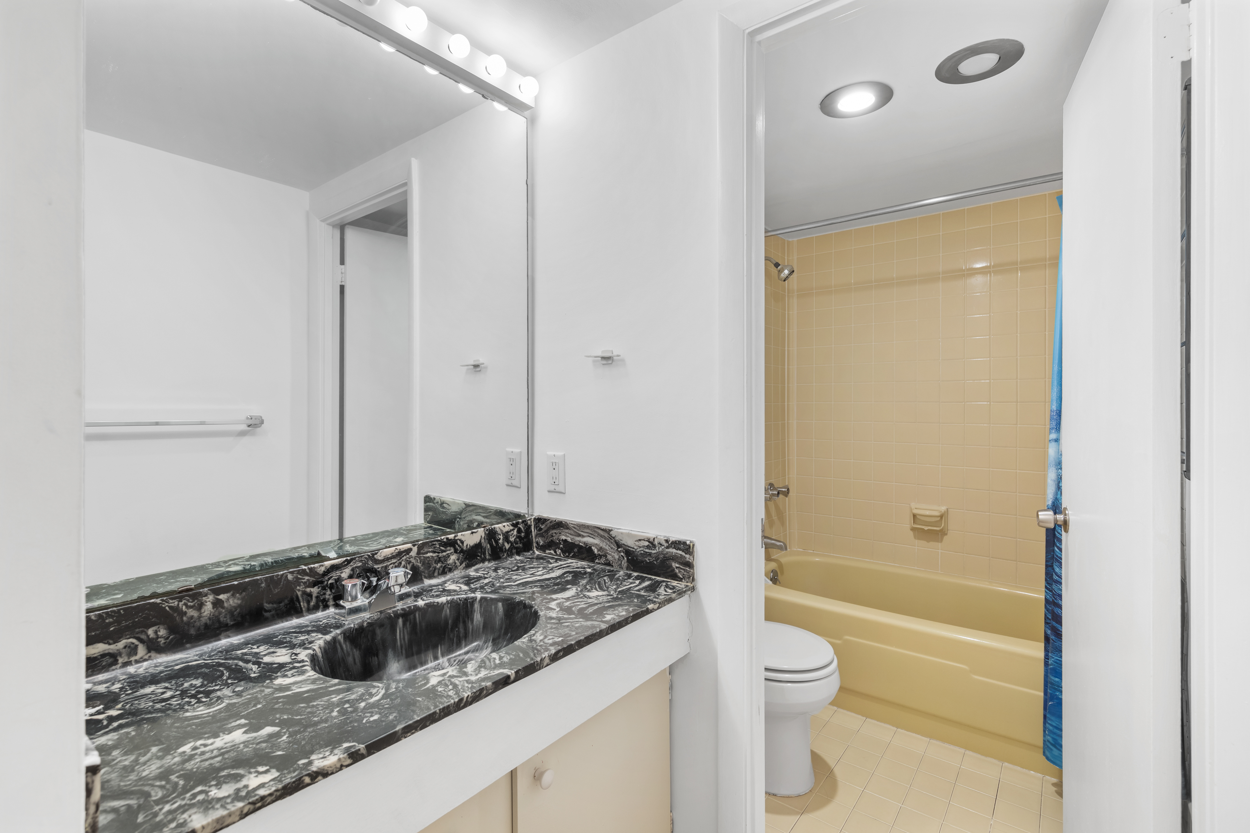 The Shared Bath is convenient to Bedroom 2 and the Living space and perfect for freshening up after a day of fun