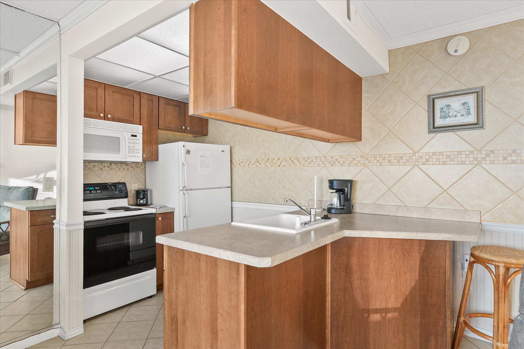 Never miss a moment of family time in this open kitchen