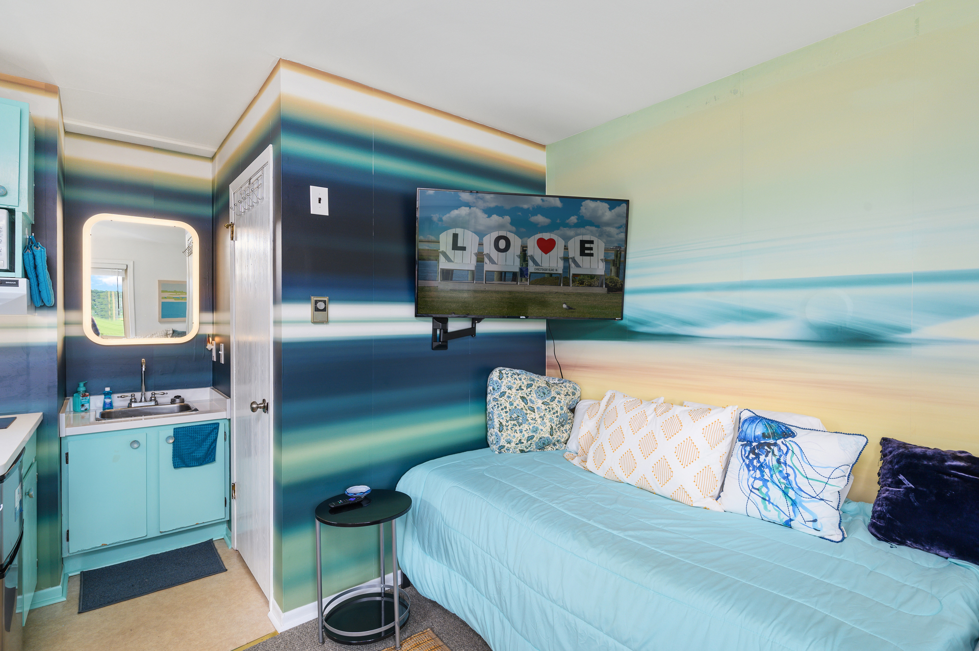 The other side has 2 Twin Beds and can double as a Living Area.