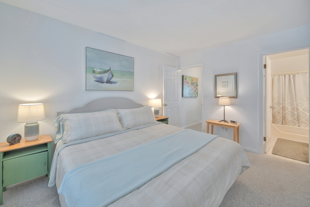 Both Bedrooms are upstairs, and Bedroom 1 has a luxurious King Bed and Flat Screen Smart TV.