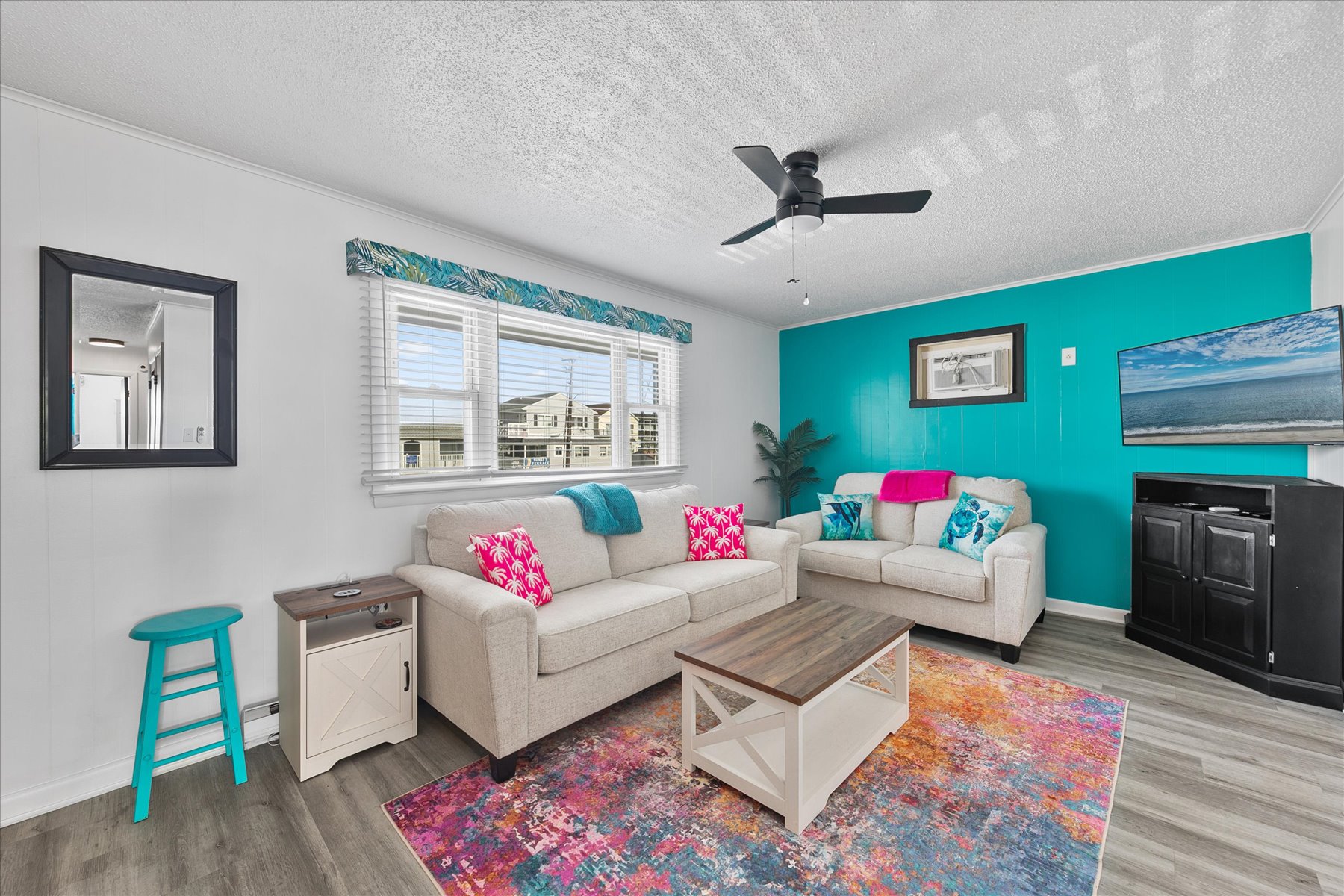 Enjoy this bright Living Area with Sleeper Sofa