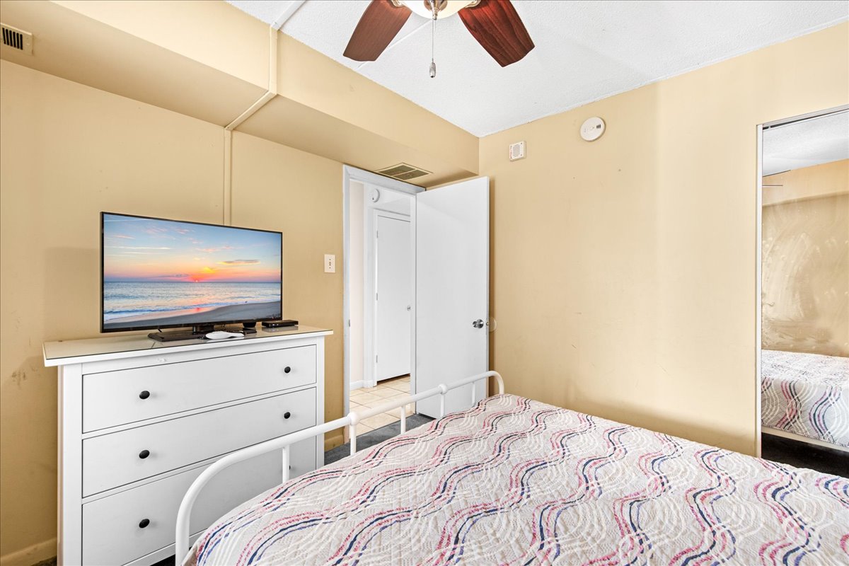 Sink into to Cozy Queen Bed after a day of Fun in the Sun!