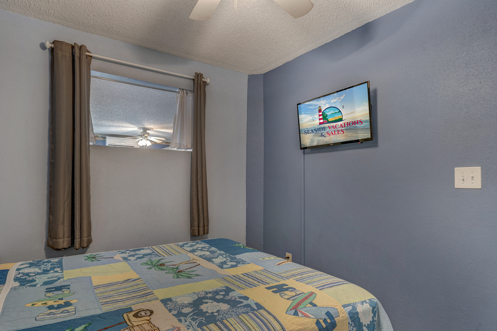 Sink into the Cozy Queen Bed and enjoy the Flat Screen Smart TV.