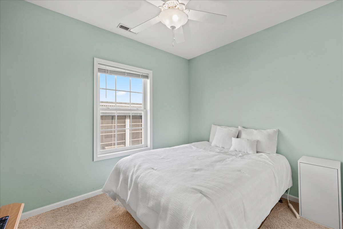 Bedroom 2 is Light, Bright & Beachy!