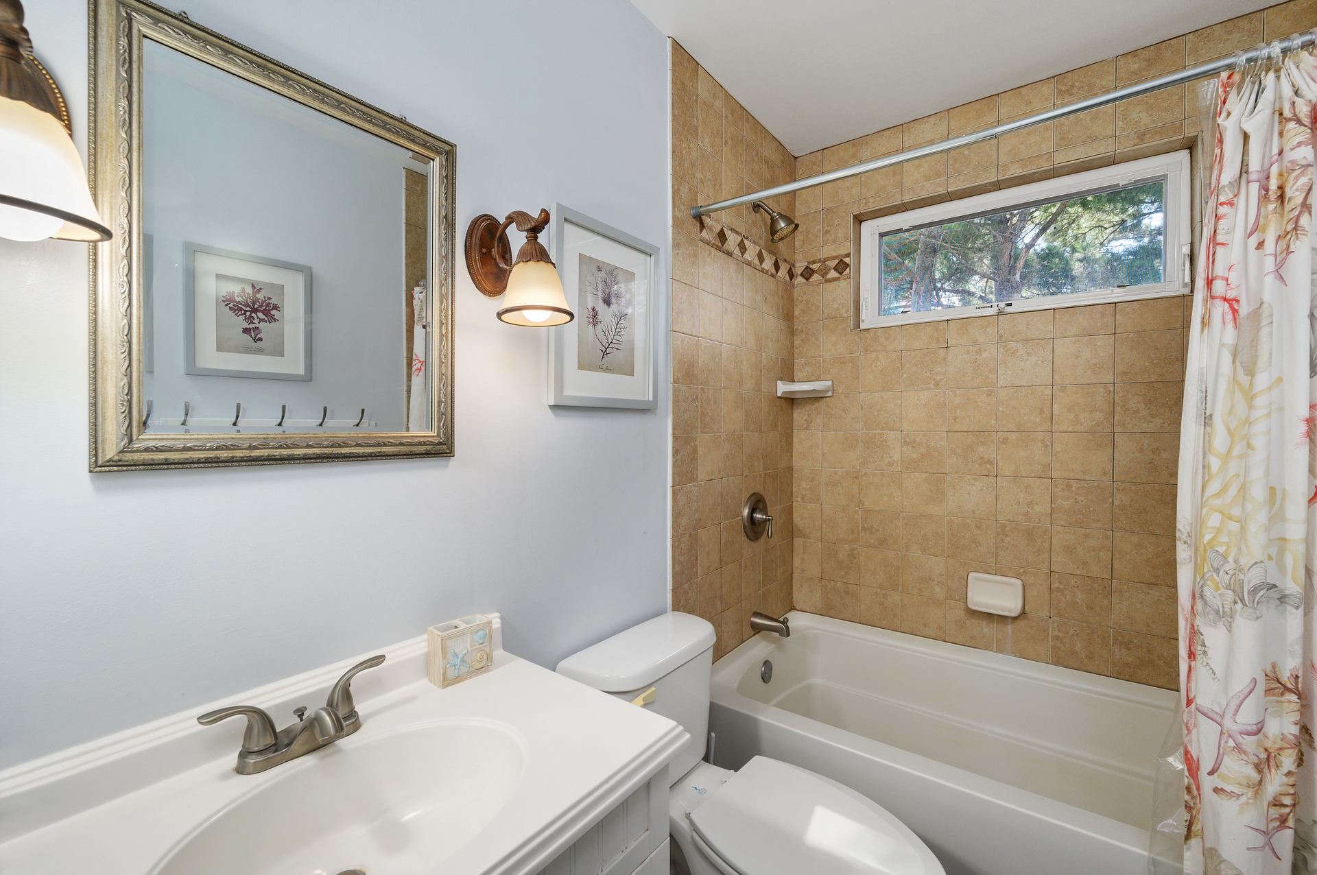 A convenient Full Bath with Tub/Shower Combo is between Bedrooms 1 and 2.