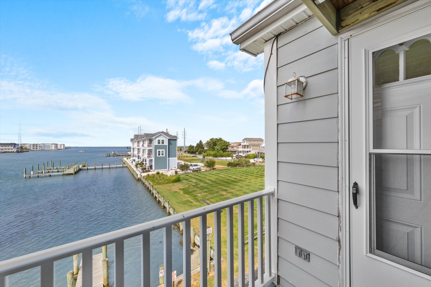 Sip a glass of pinot as the sun sinks into the water.