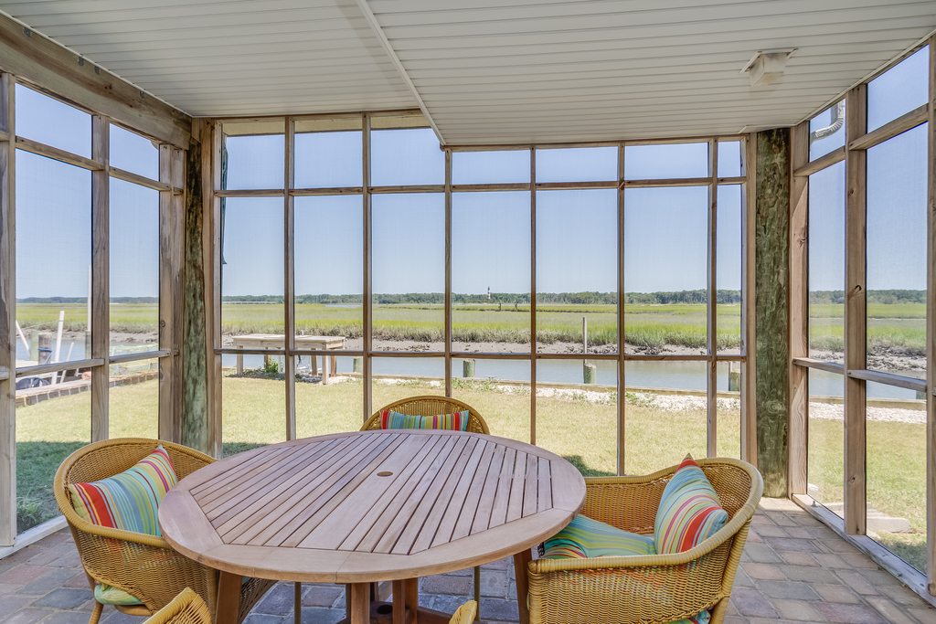 Or dine Al-Fresco on the water's edge on the Screened Porch.