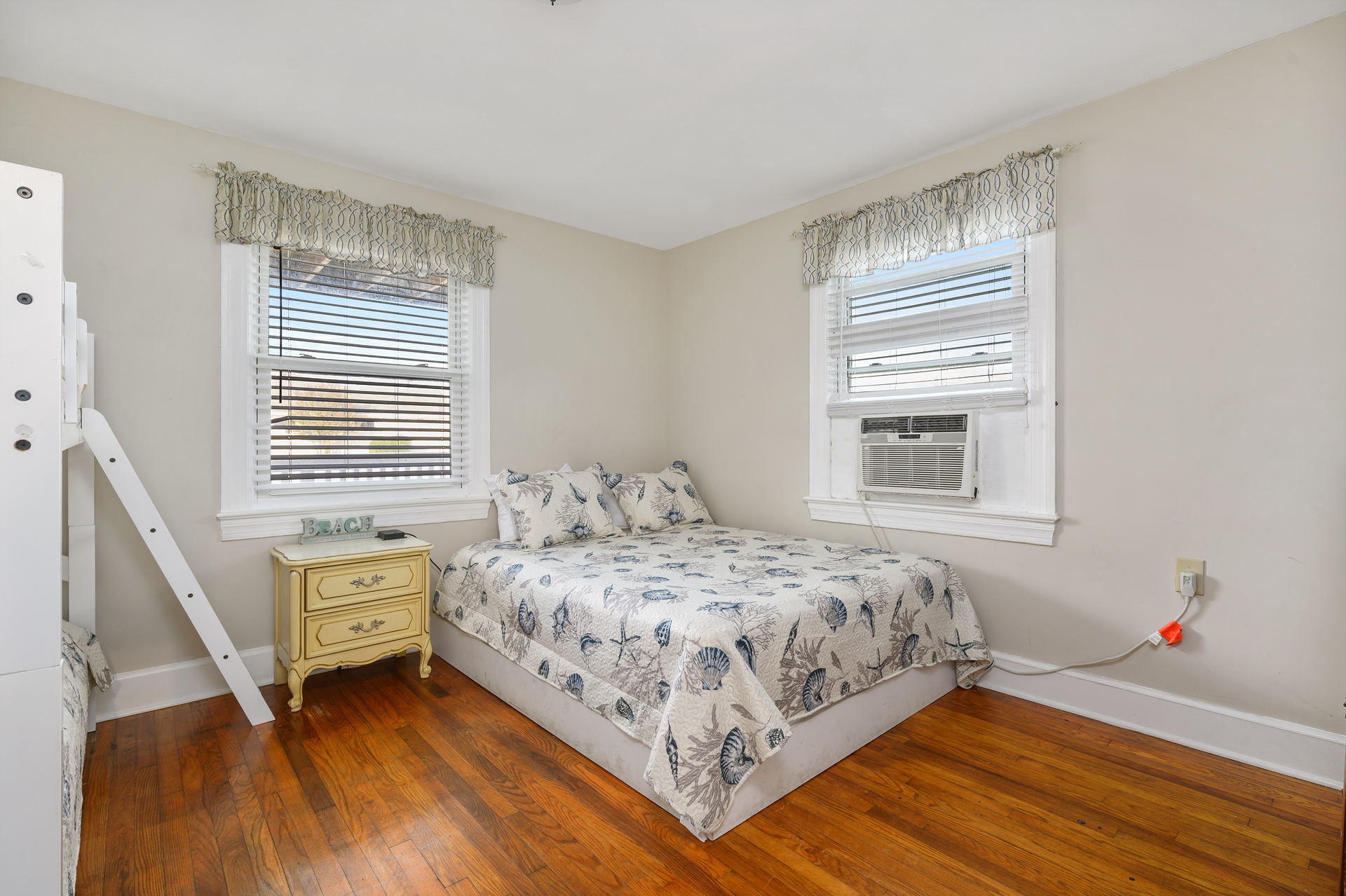 Bedroom 3 offers another comfortable queen bed and twin bunk