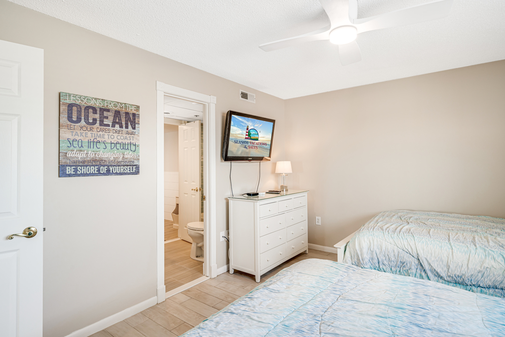 Relax after a fun-filled beach day and enjoy the Flat Screen TV.
