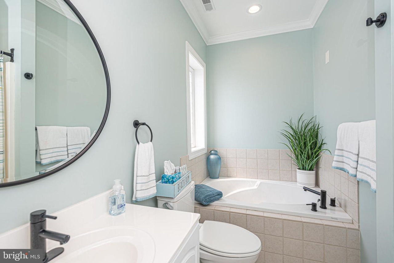 Full Bath attached to Bedroom 2.