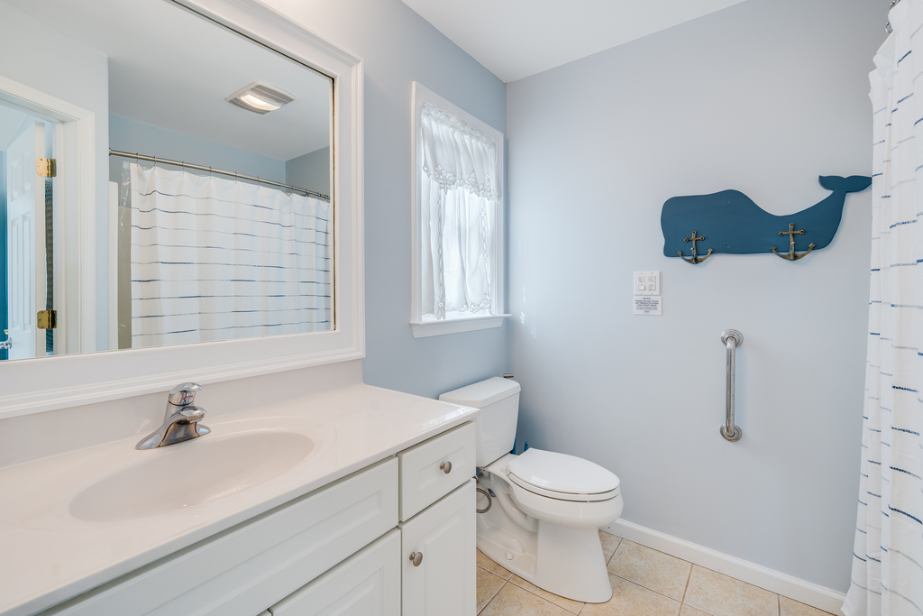 Attached Full Bath in Primary Bedroom.