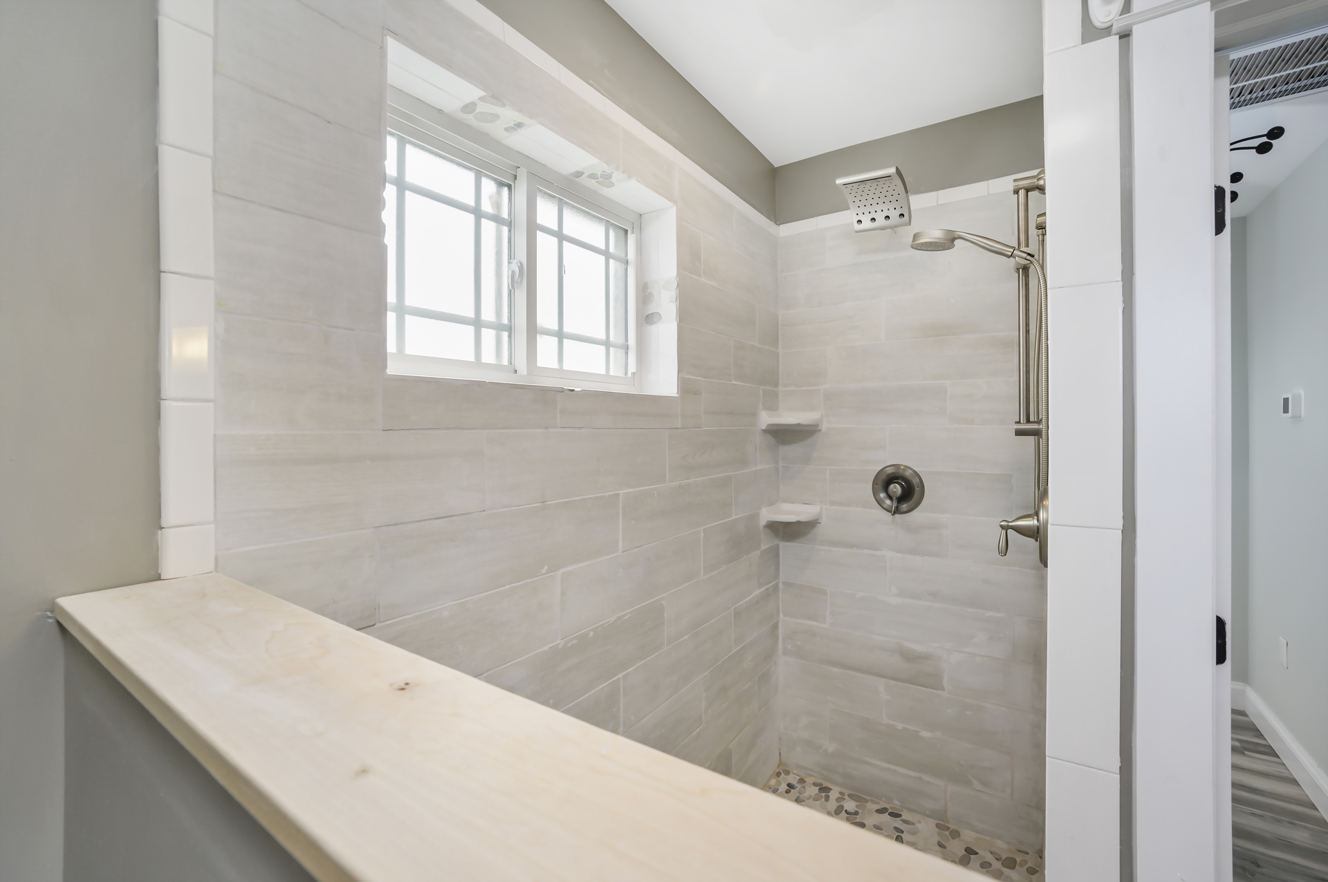 Open Concept Walk-in Shower with gorgeous Tile Work.
