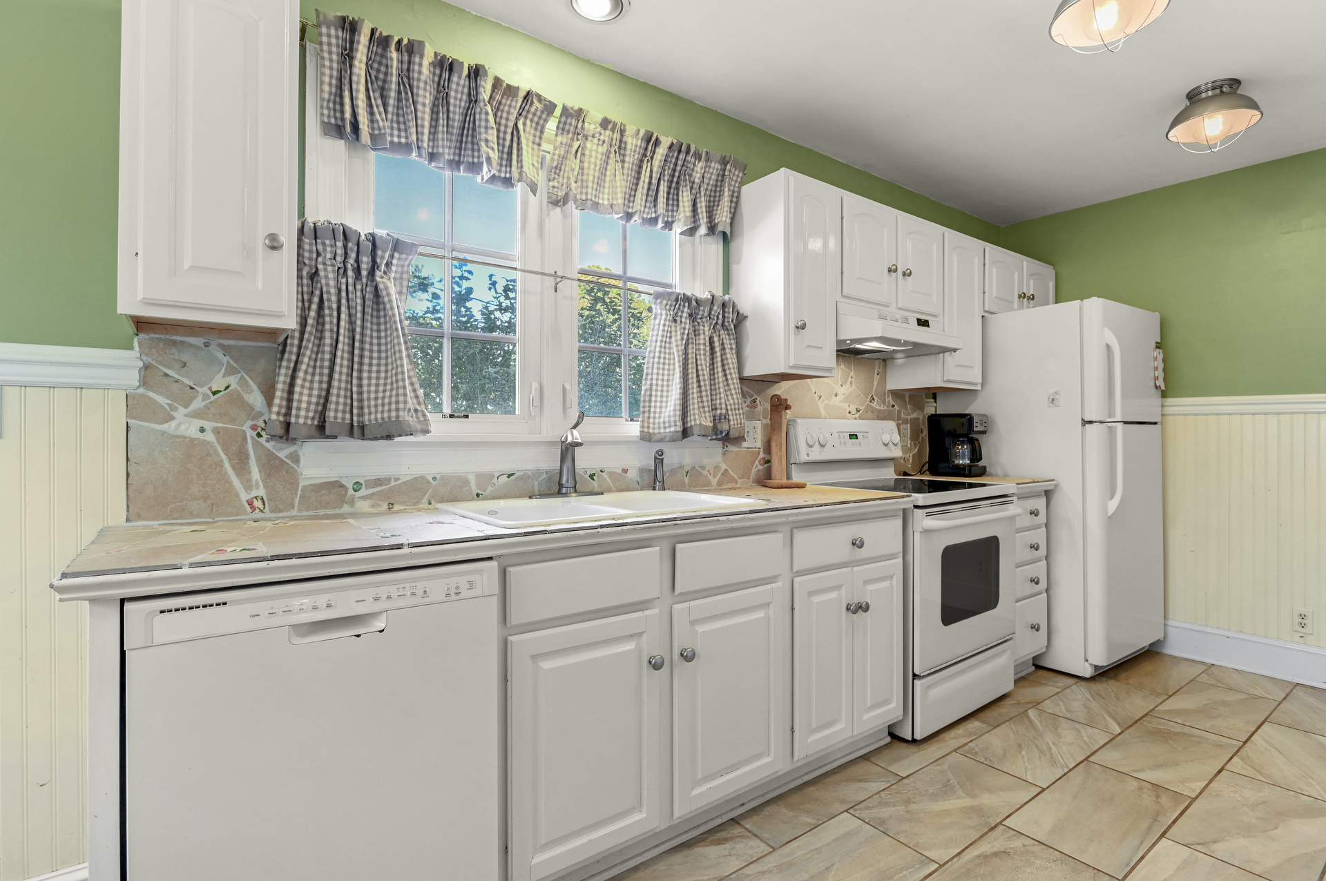 Truly unique with a Custom Back Splash created with Stone & Sea Glass.