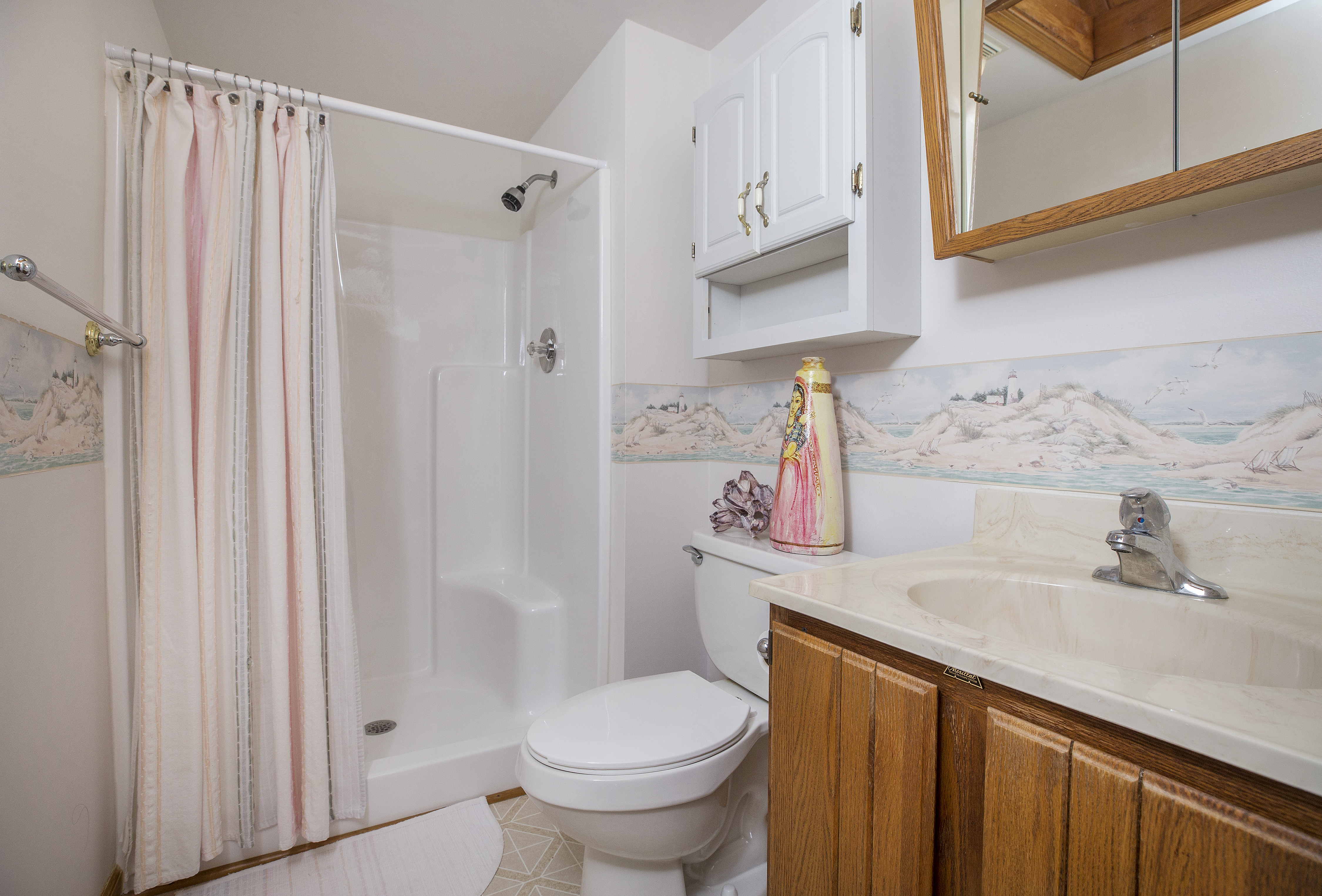 Coastal Decor throughout is light and bright.