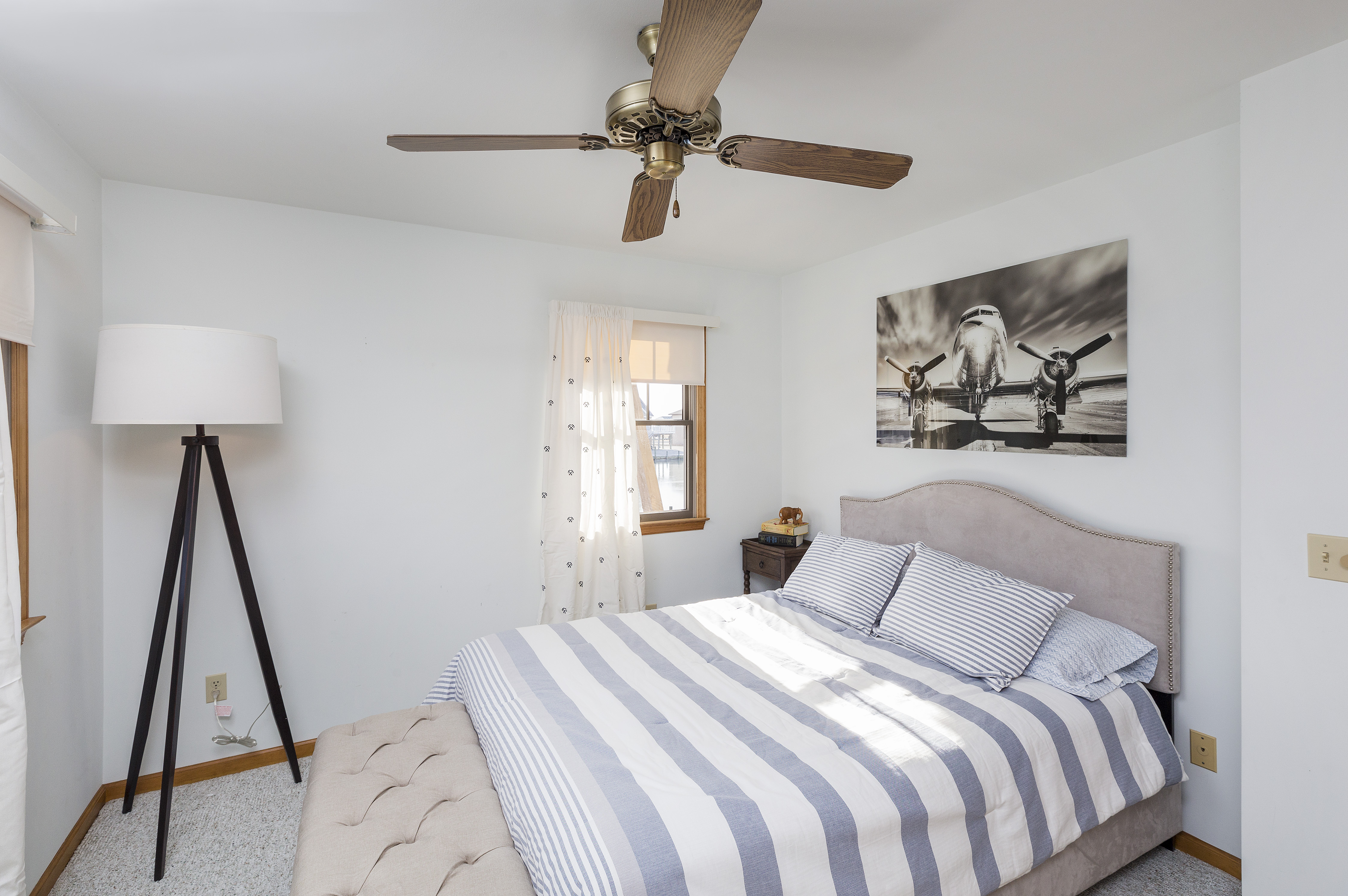 Bedroom 2 oozes Coastal Charm and has a Queen Bed.
