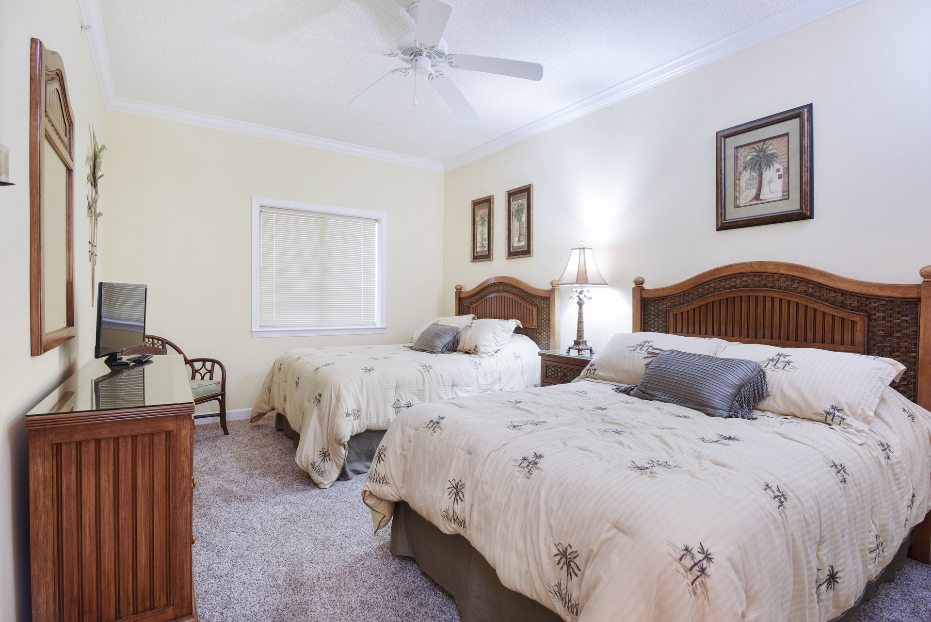 Bedroom 2 has 2 Full Beds and Luxurious Tropical Bedding.