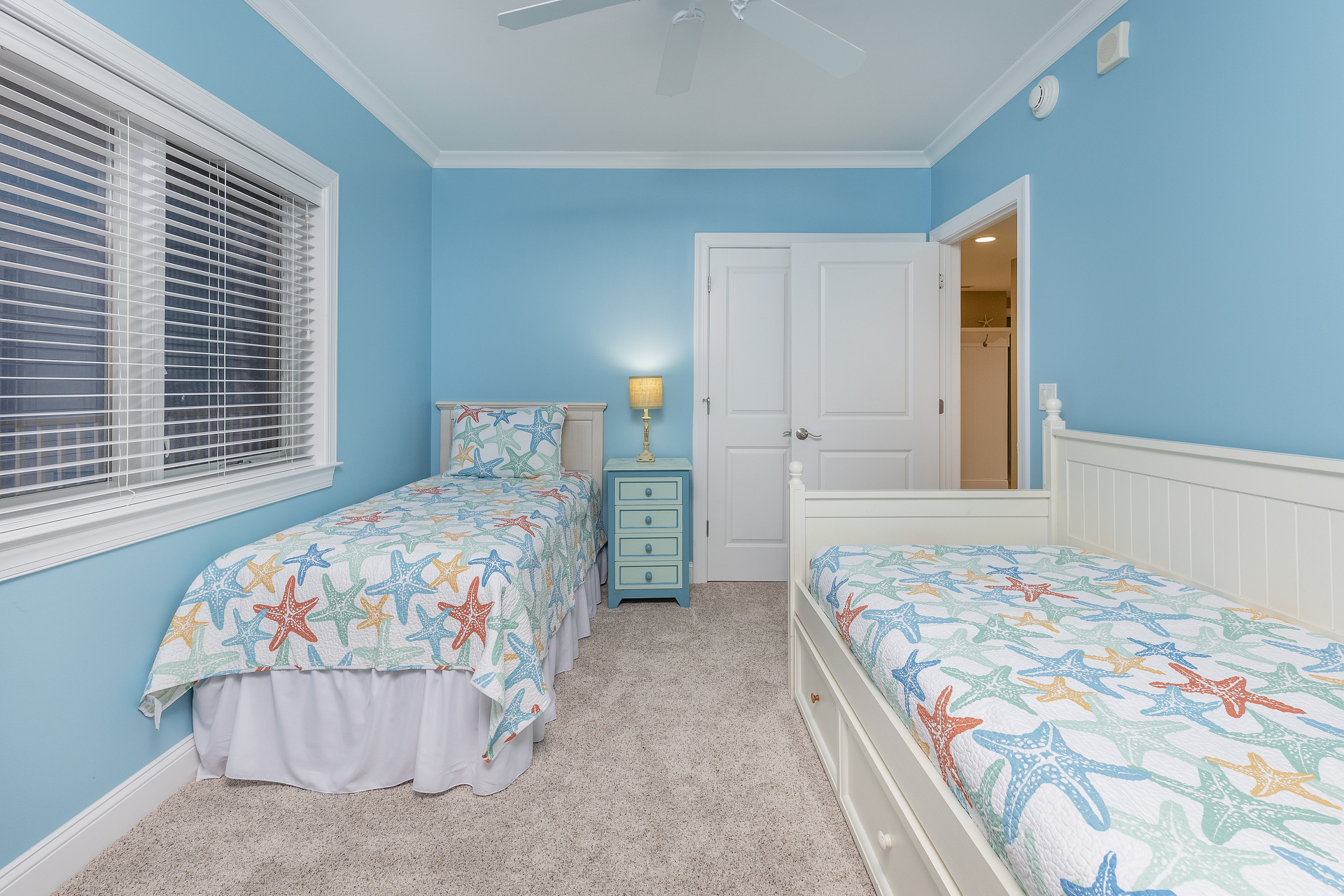 Bedroom 3 has a 2 Twins plus 1 Trundle and a tranquil Starfish Theme.