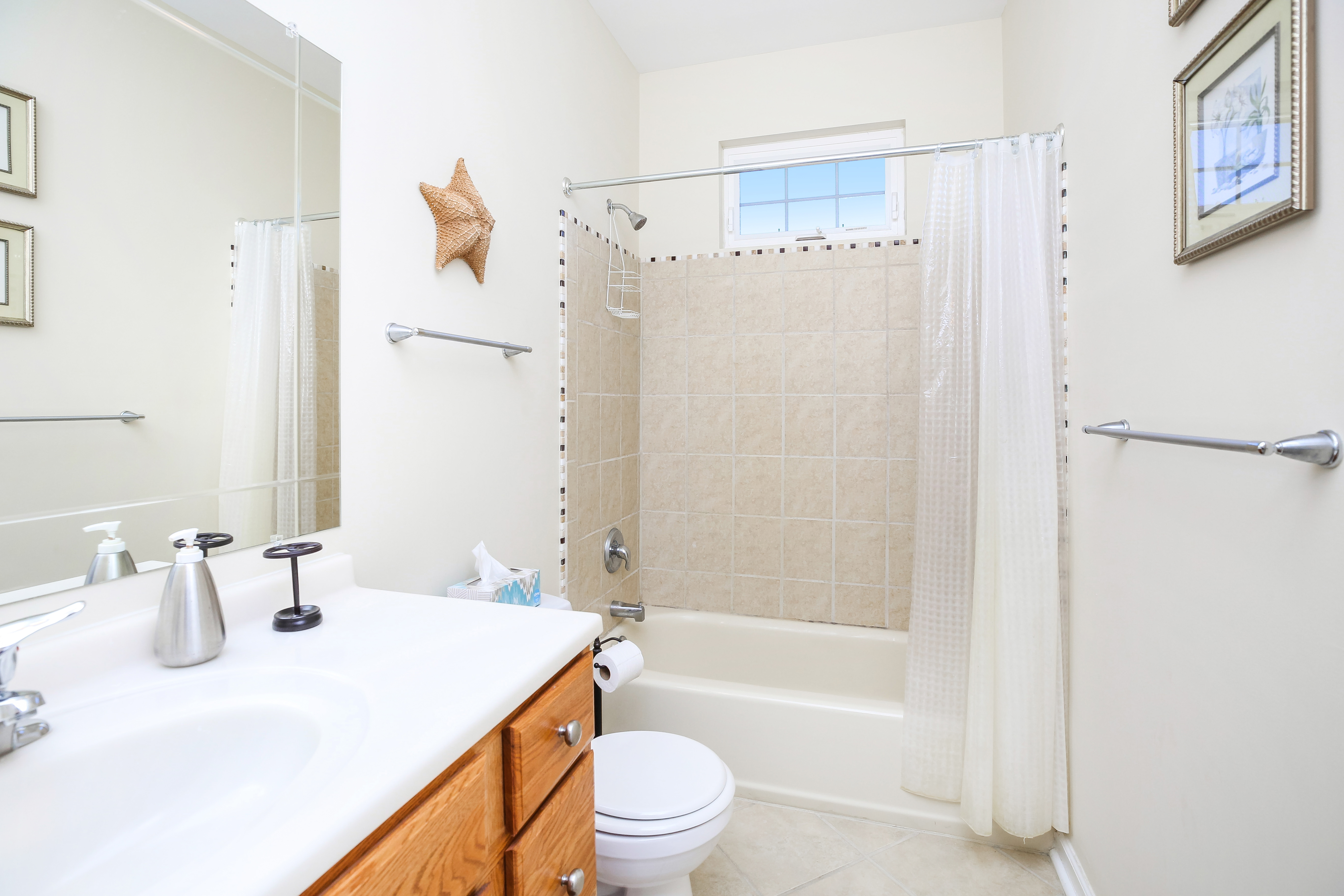Full Bath 1 has a Tub/Shower Combo and gorgeous Custom Tile.