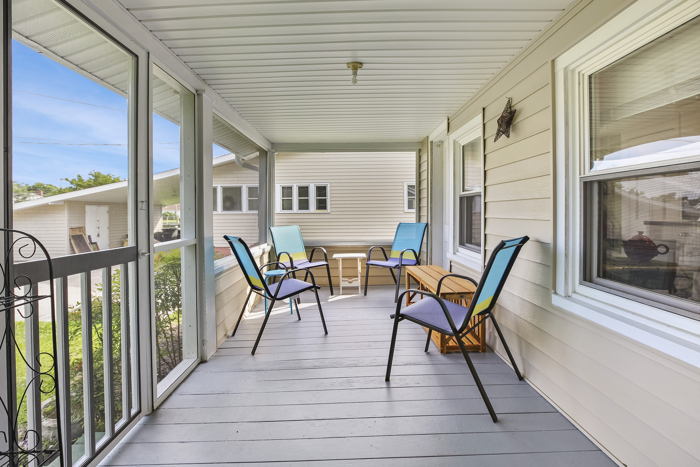 Lovely Front Screened Porch is a great place to share stories at the day`s end.