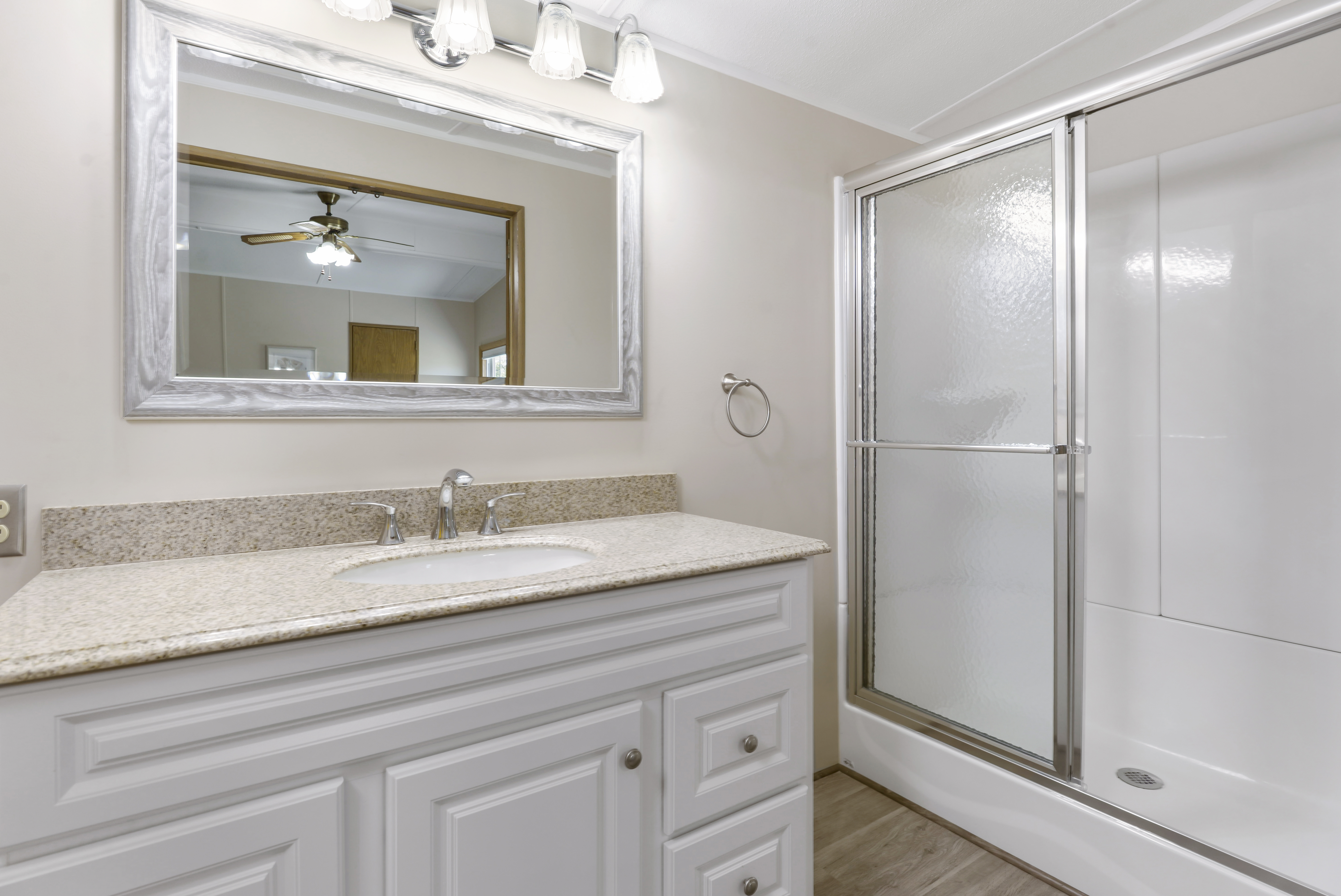 Breathtaking Master Bath with Granite and Walk-in Shower.