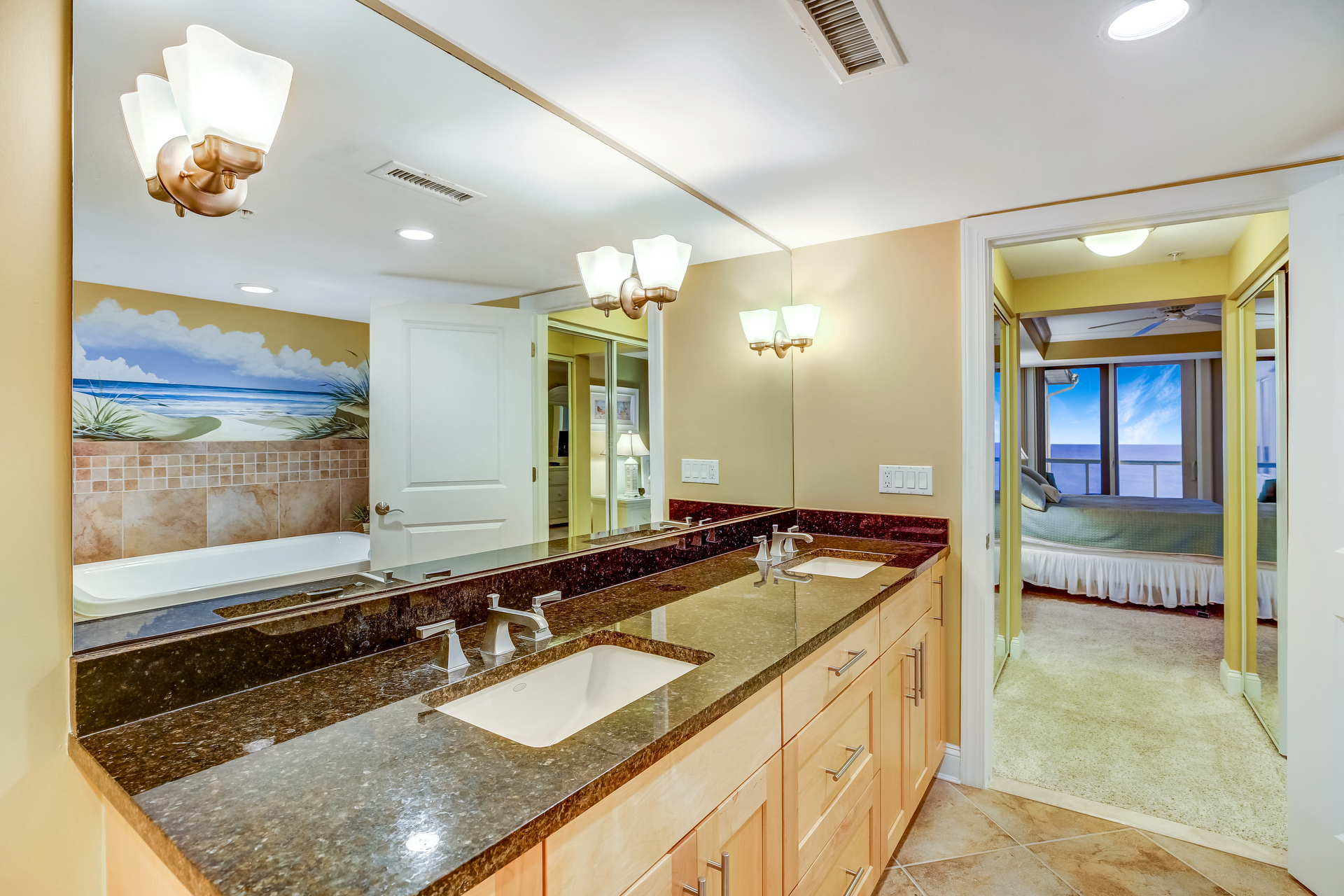 Gleaming Granite and Double Sinks in the Primary Bath.