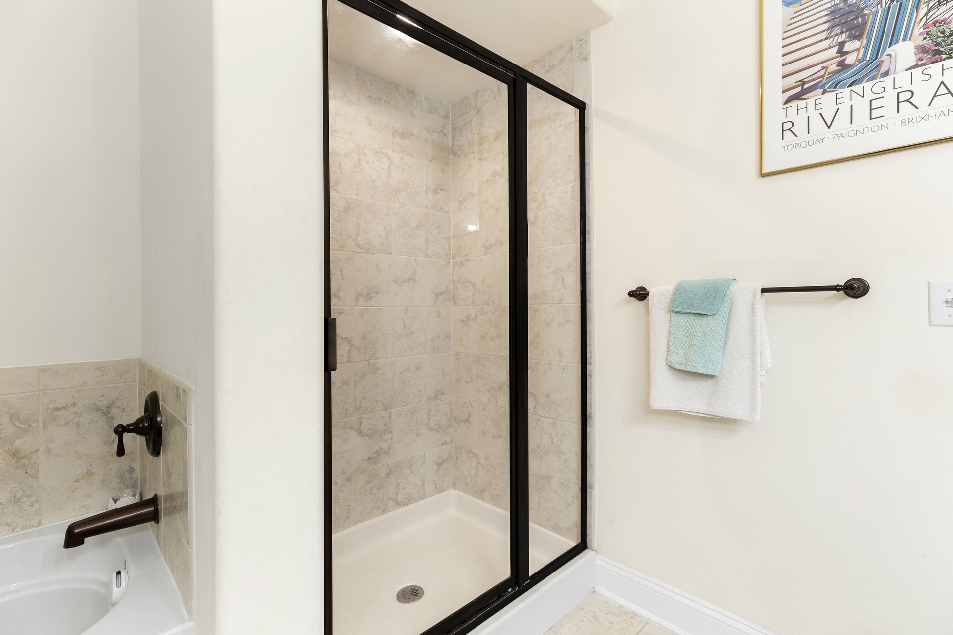 Take a relaxing soak in the Tub or enjoy the Walk-in Shower with Custom Tile.