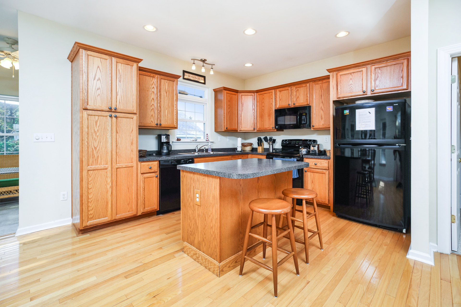 Well-equipped Kitchen with Breakfast Bar will delight the Chef in your Family.