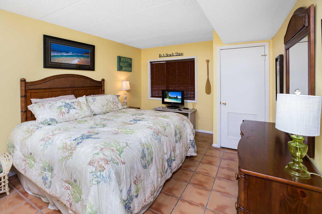 Primary Bedroom with a California King and huge closet overlooks the Canal below.