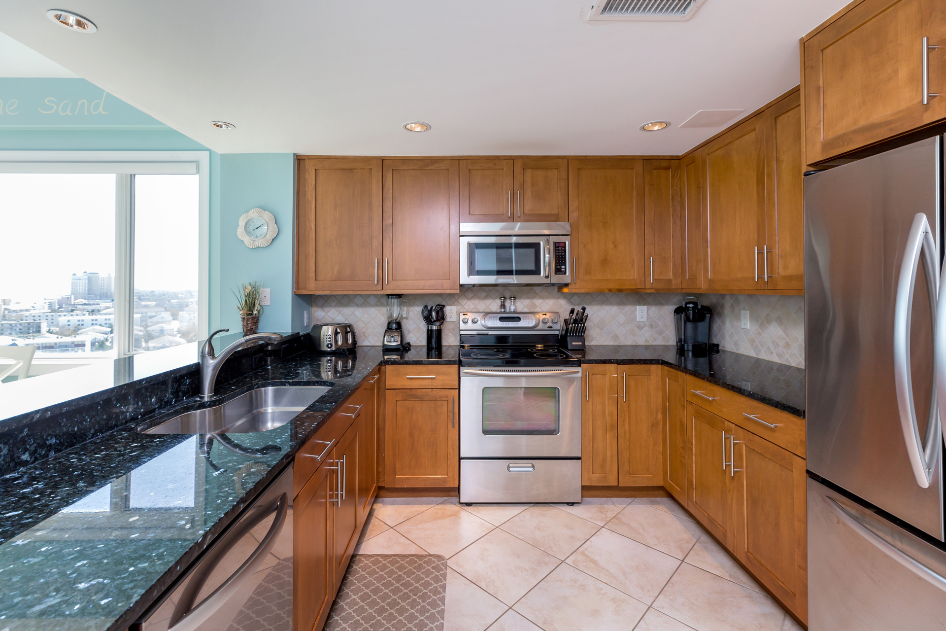 Gourmet Kitchen with state-of-the-art Stainless Appliances.