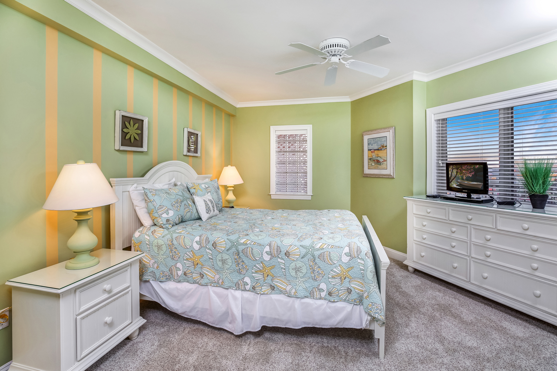 Bedroom 3 has a comfy Queen Bed and colors of Sea Glass.