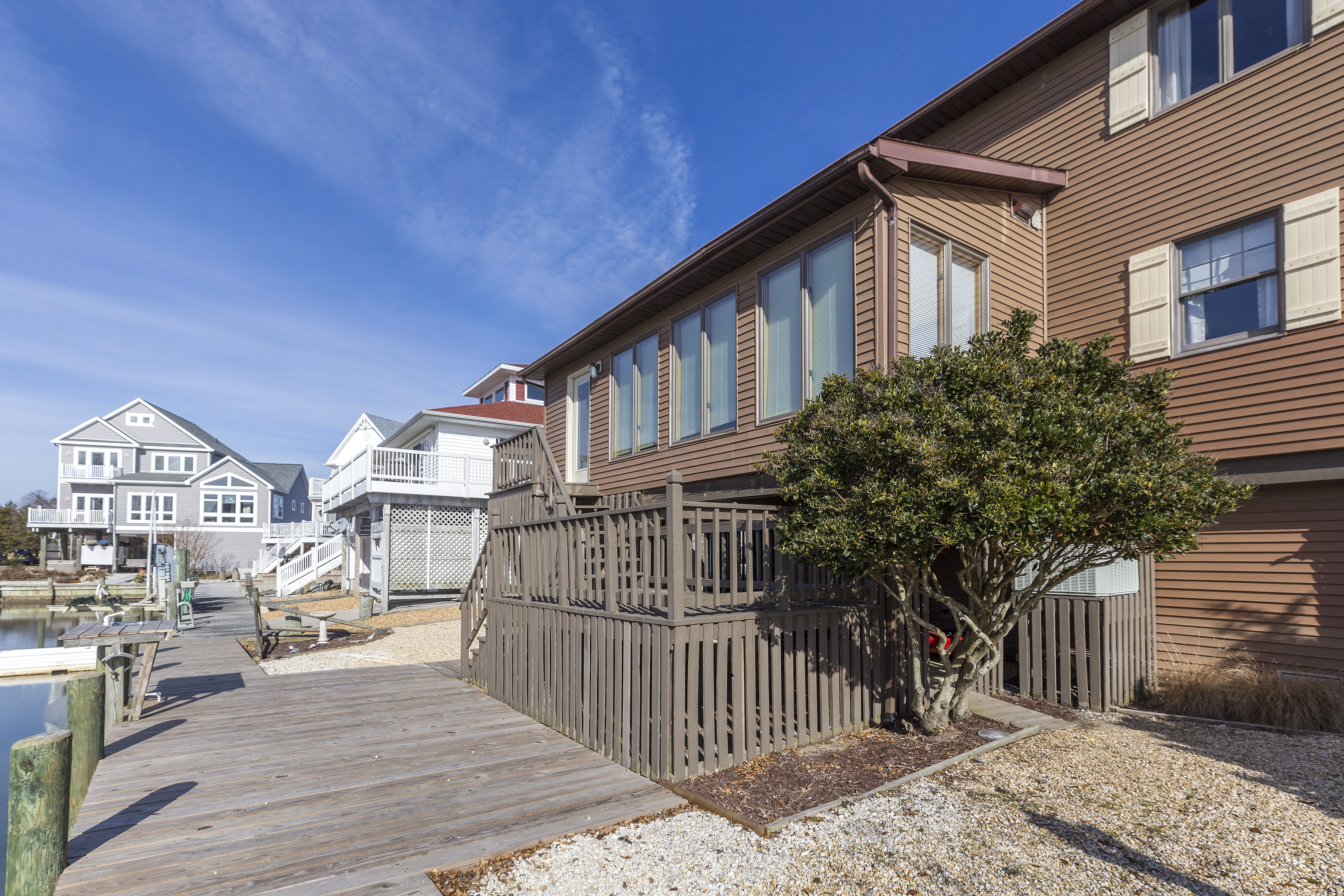 Fabulous Backyard with Private Dock, Fish Cleaning Table, and Deck.