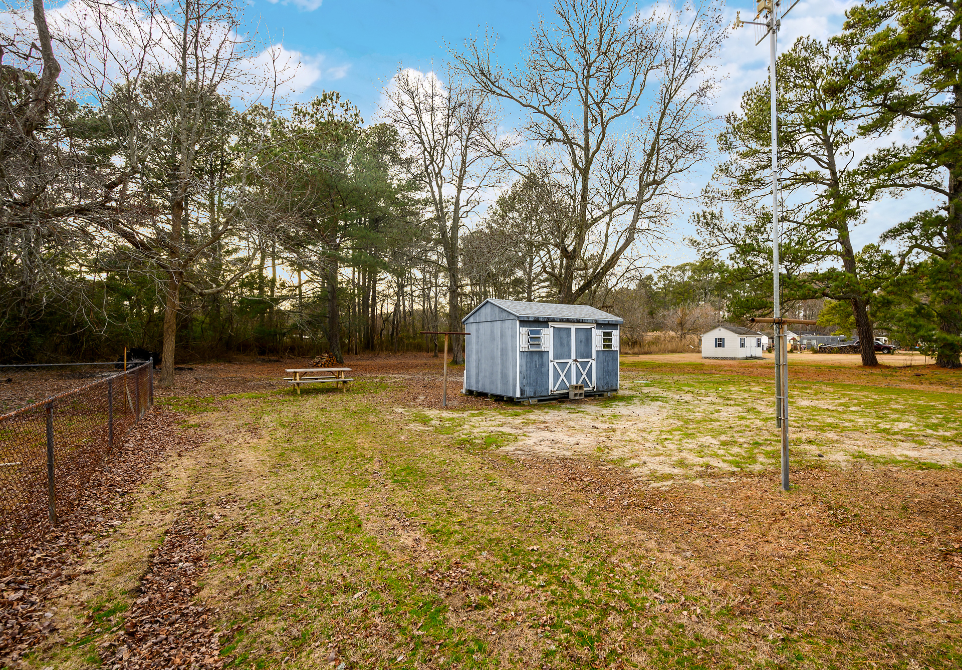 Spacious Backyard with lots of shade trees.